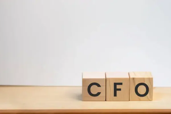 CFO on wooden background